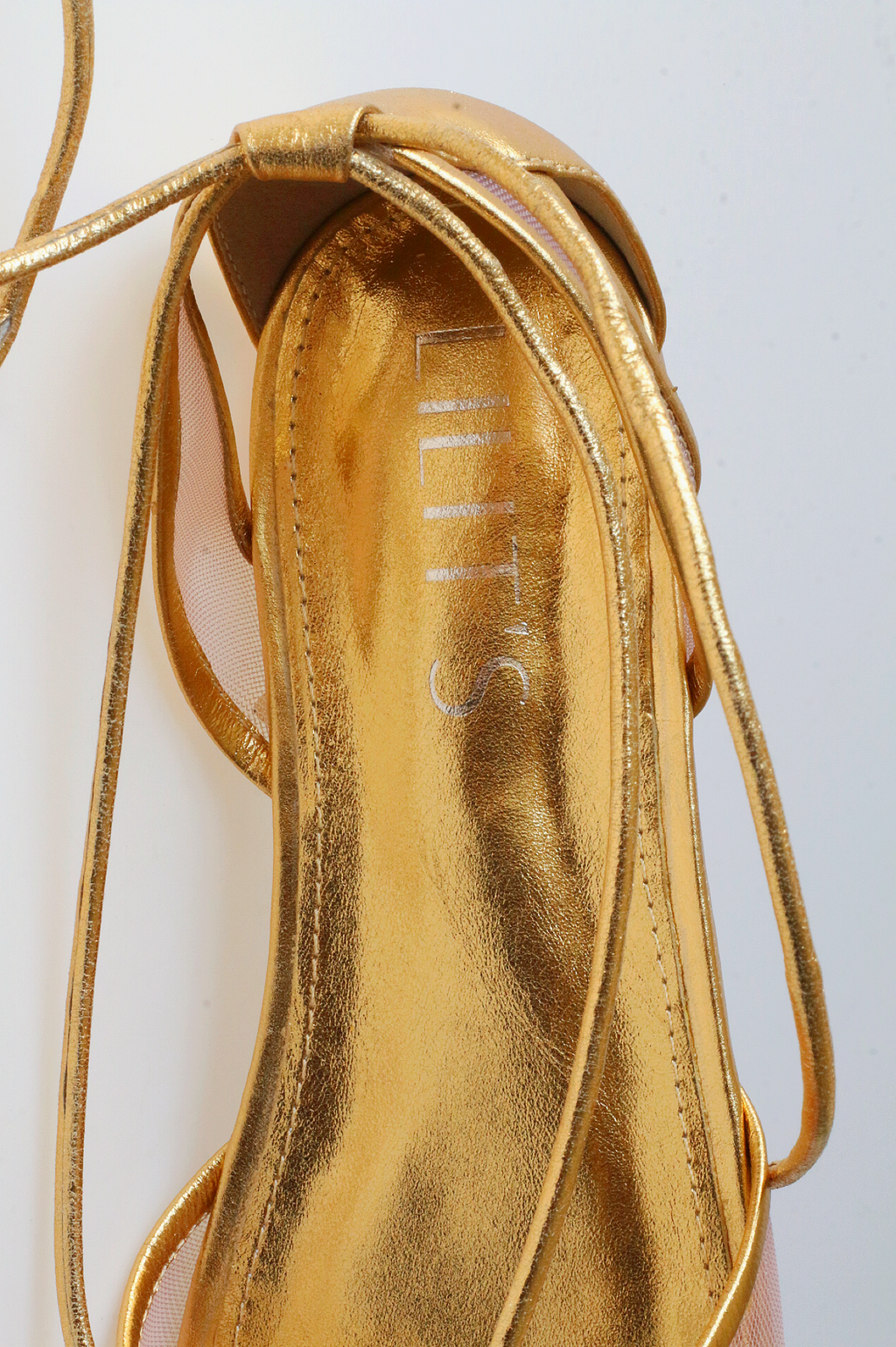Gold ballerina Valerie with mesh details.