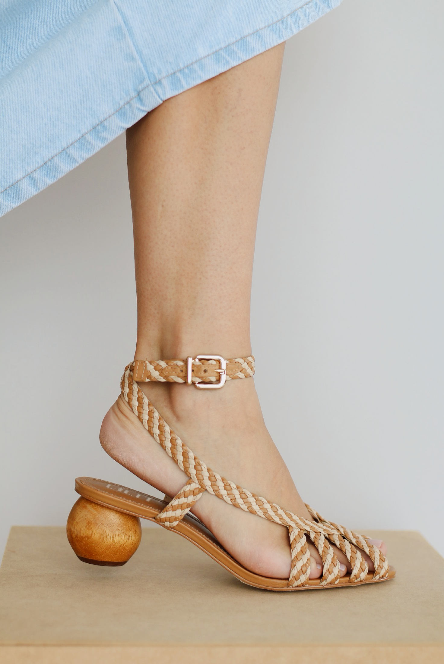 Abby sandal with two-tone braided detail and chestnut wood heel.