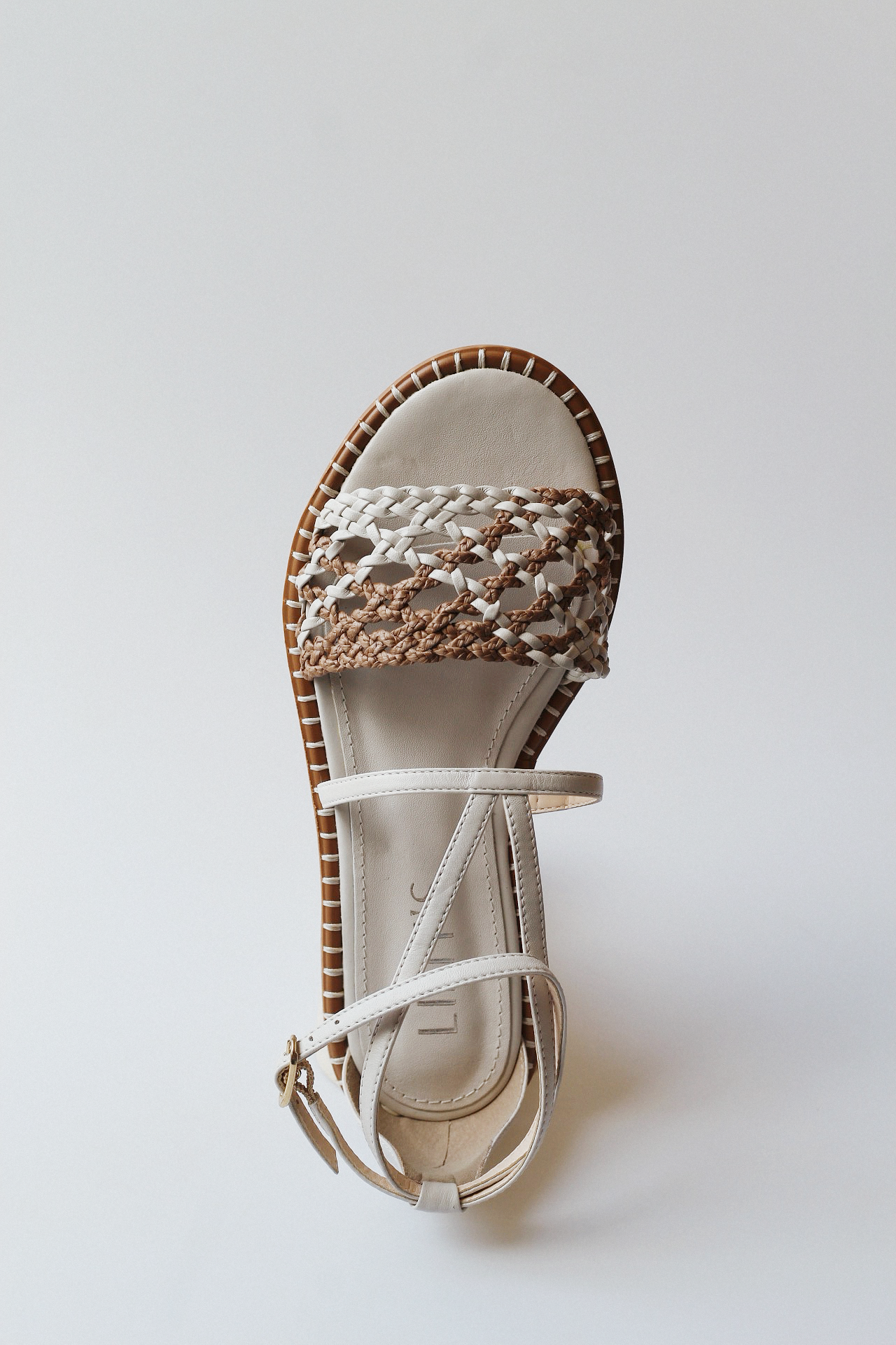 Isla sandal with braided detail and off-white raffia.