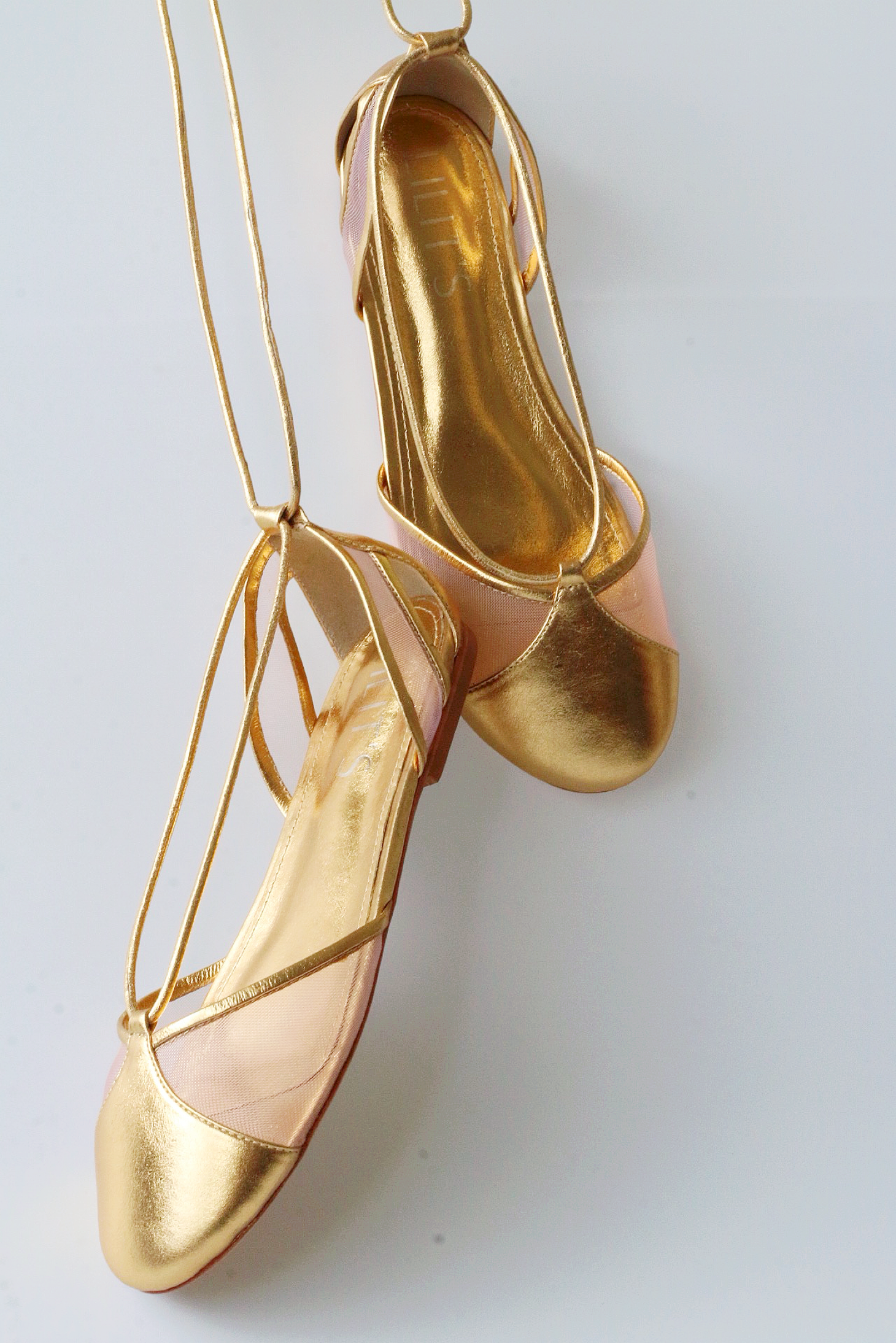 Gold ballerina Valerie with mesh details.