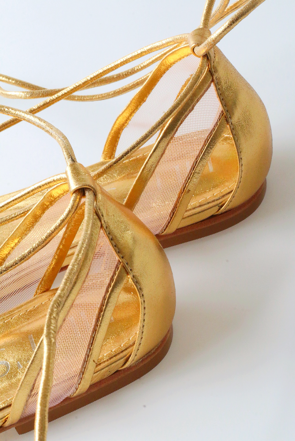 Gold ballerina Valerie with mesh details.