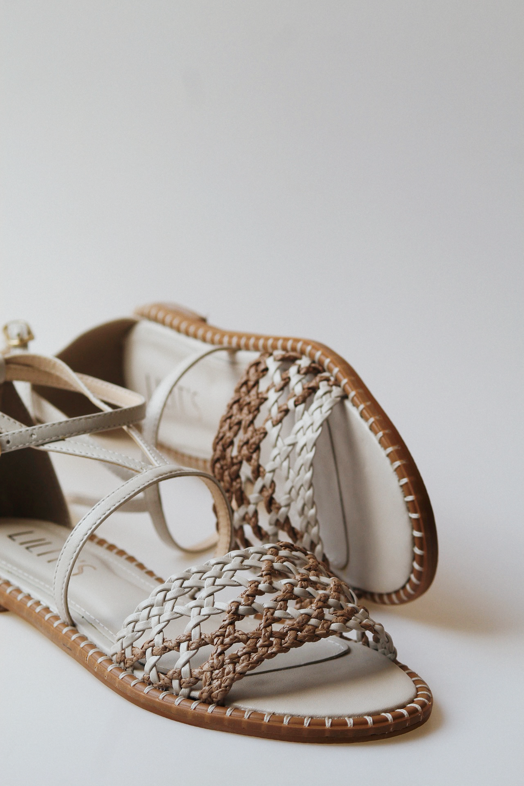 Isla sandal with braided detail and off-white raffia.