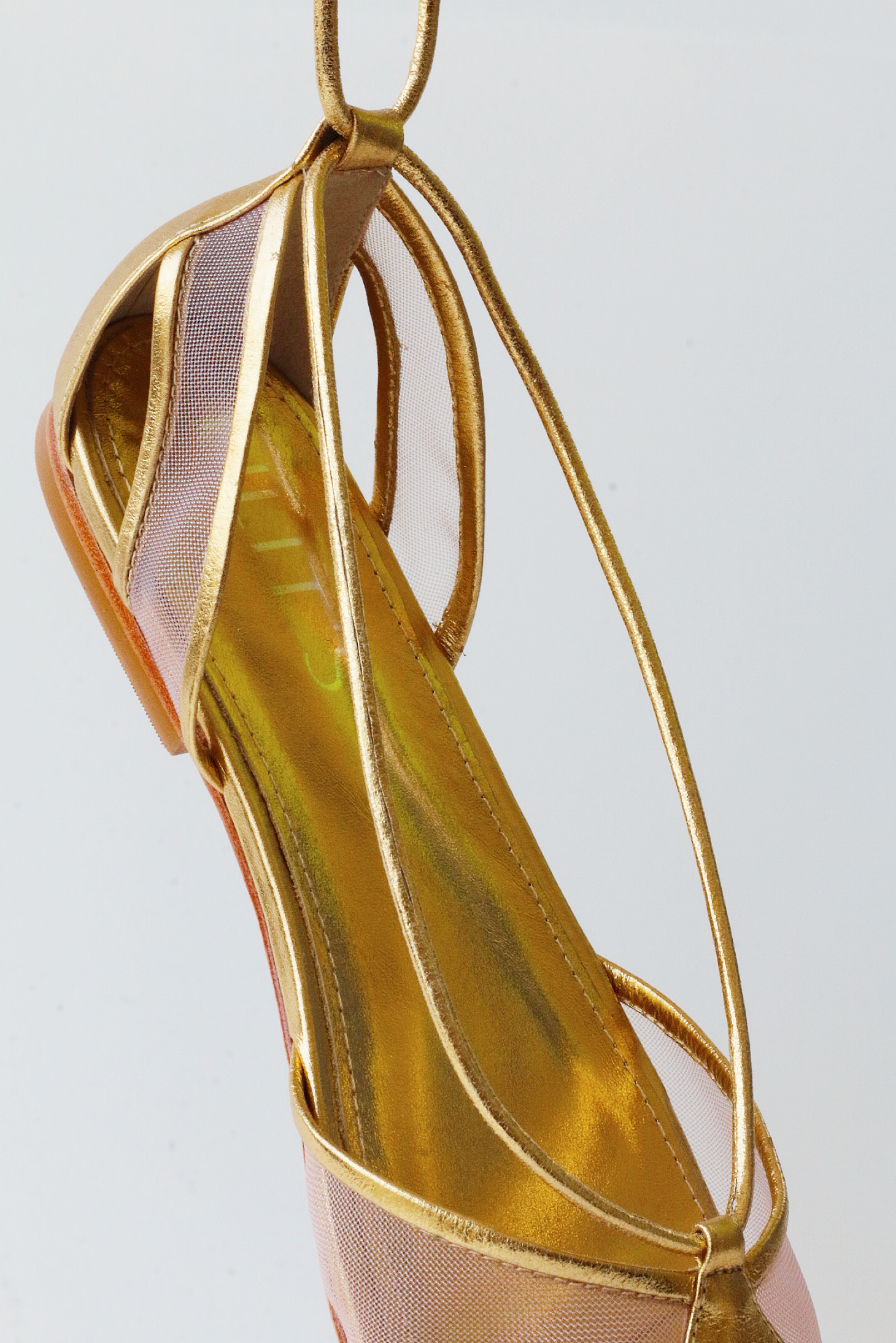 Gold ballerina Valerie with mesh details.