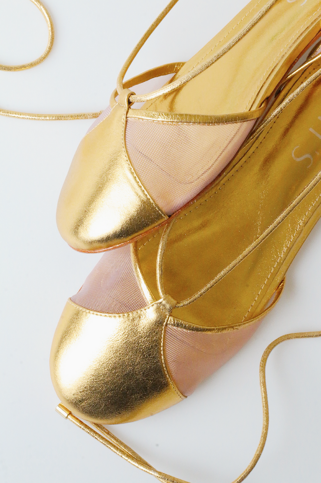 Gold ballerina Valerie with mesh details.