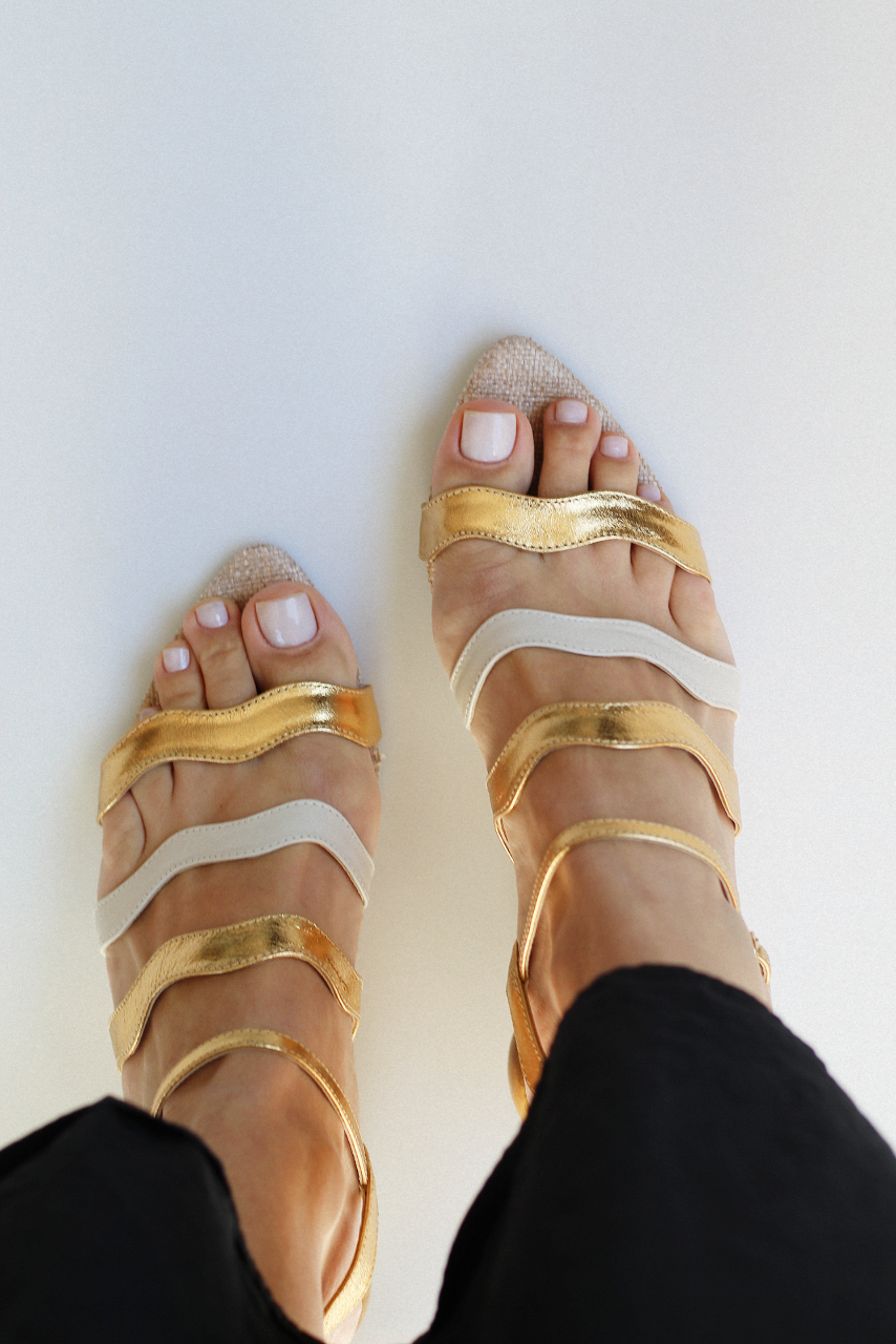 Gaspea sandal in gold and off-white with acrylic sphere heel and chestnut wood.
