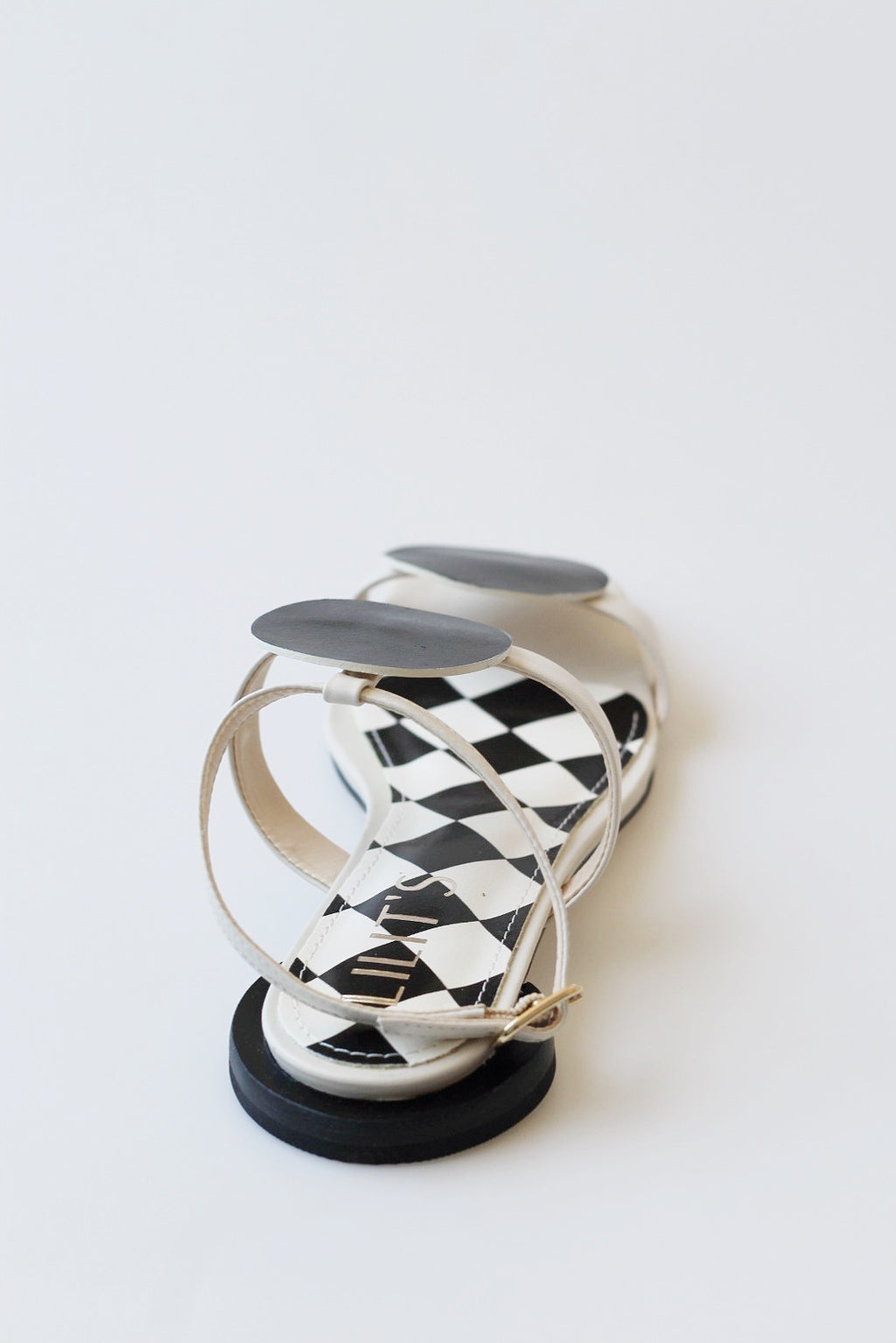 Black and white geometric sandal