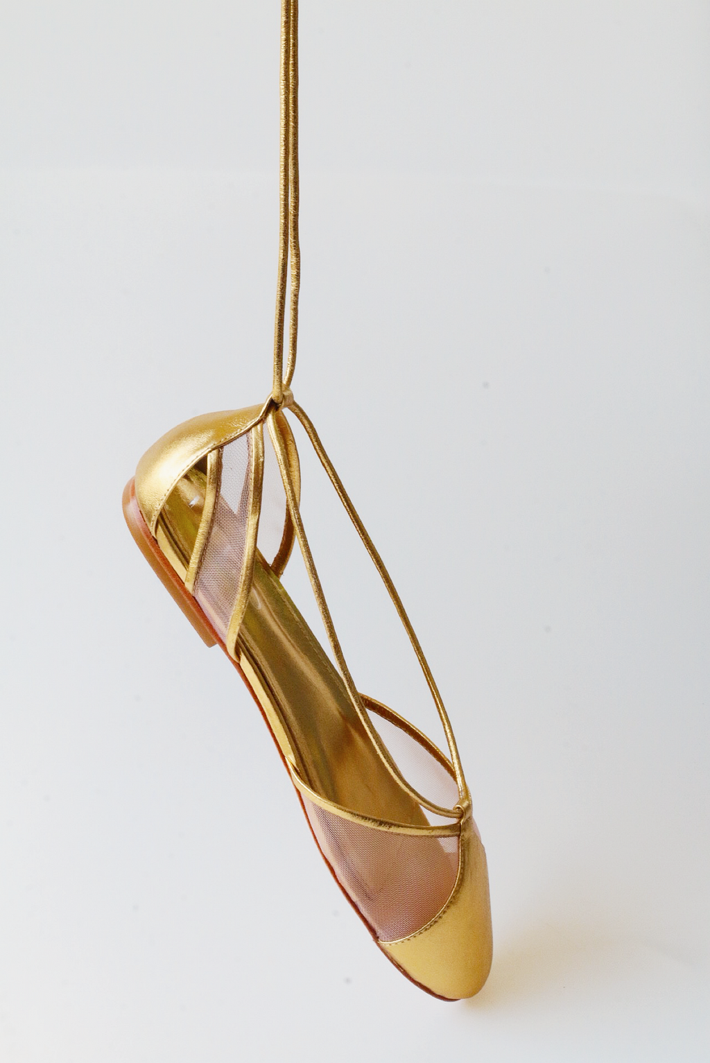 Gold ballerina Valerie with mesh details.