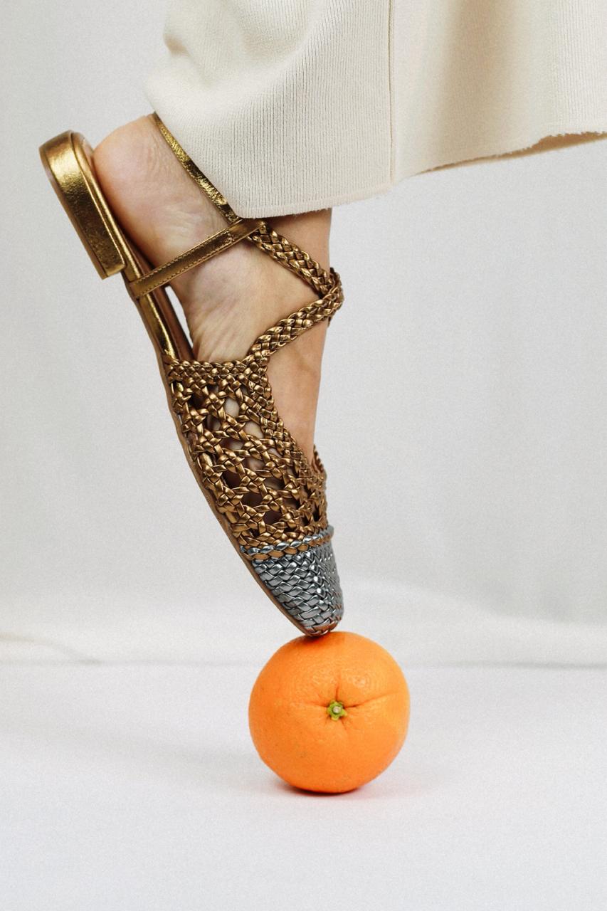 Mary Jane ballet flat with braided detail in bronze and silver.