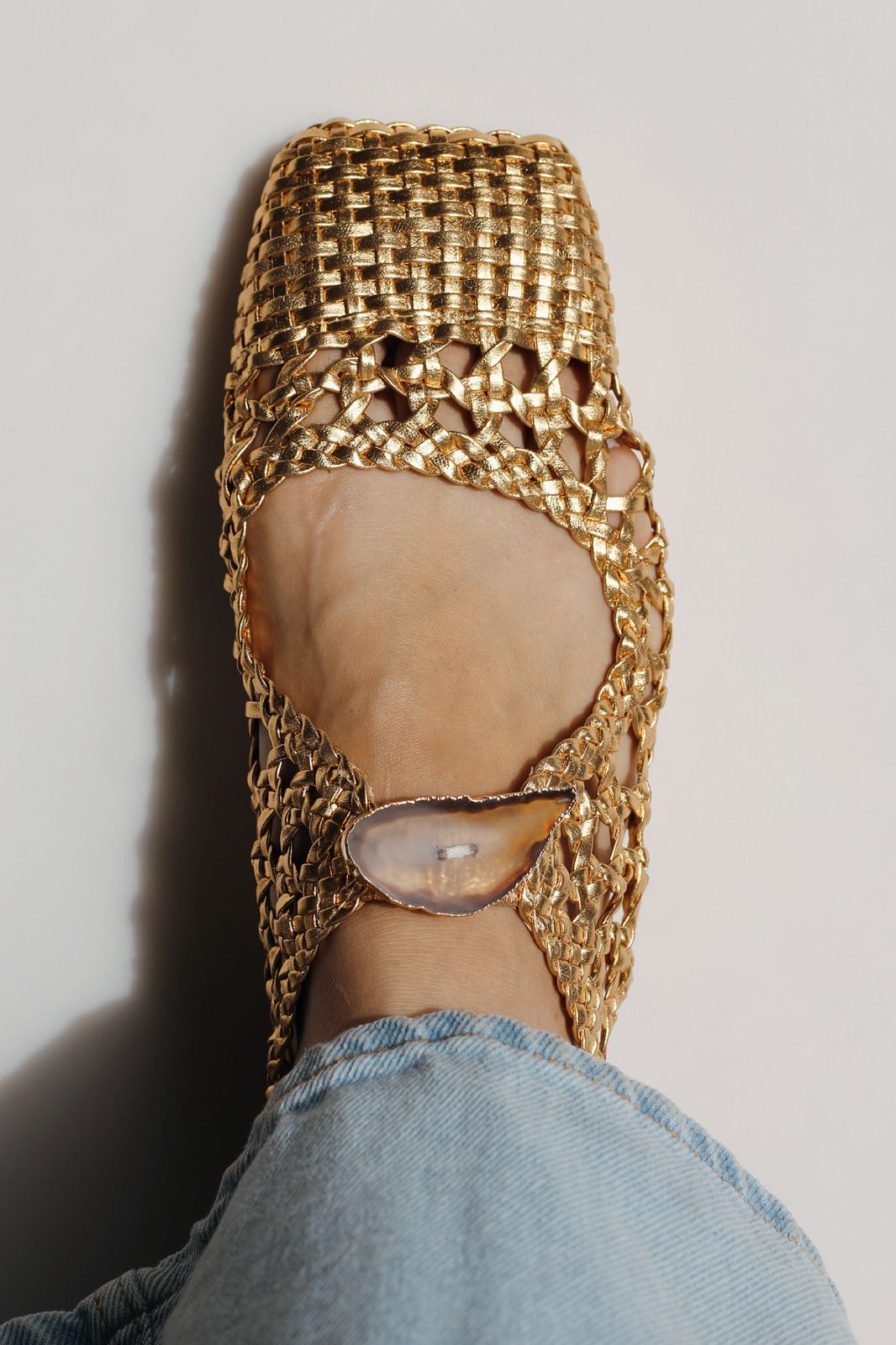 Ballerina Farah in braided dress and natural agate stone.