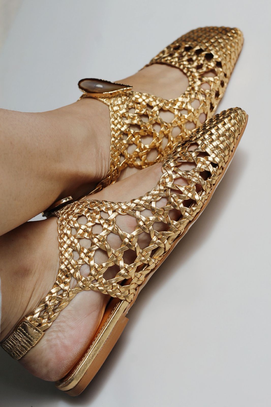 Ballerina Farah in braided dress and natural agate stone.