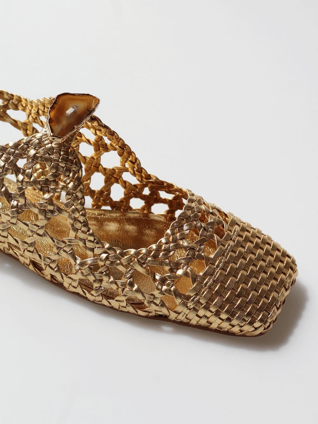 Ballerina Farah in braided dress and natural agate stone.