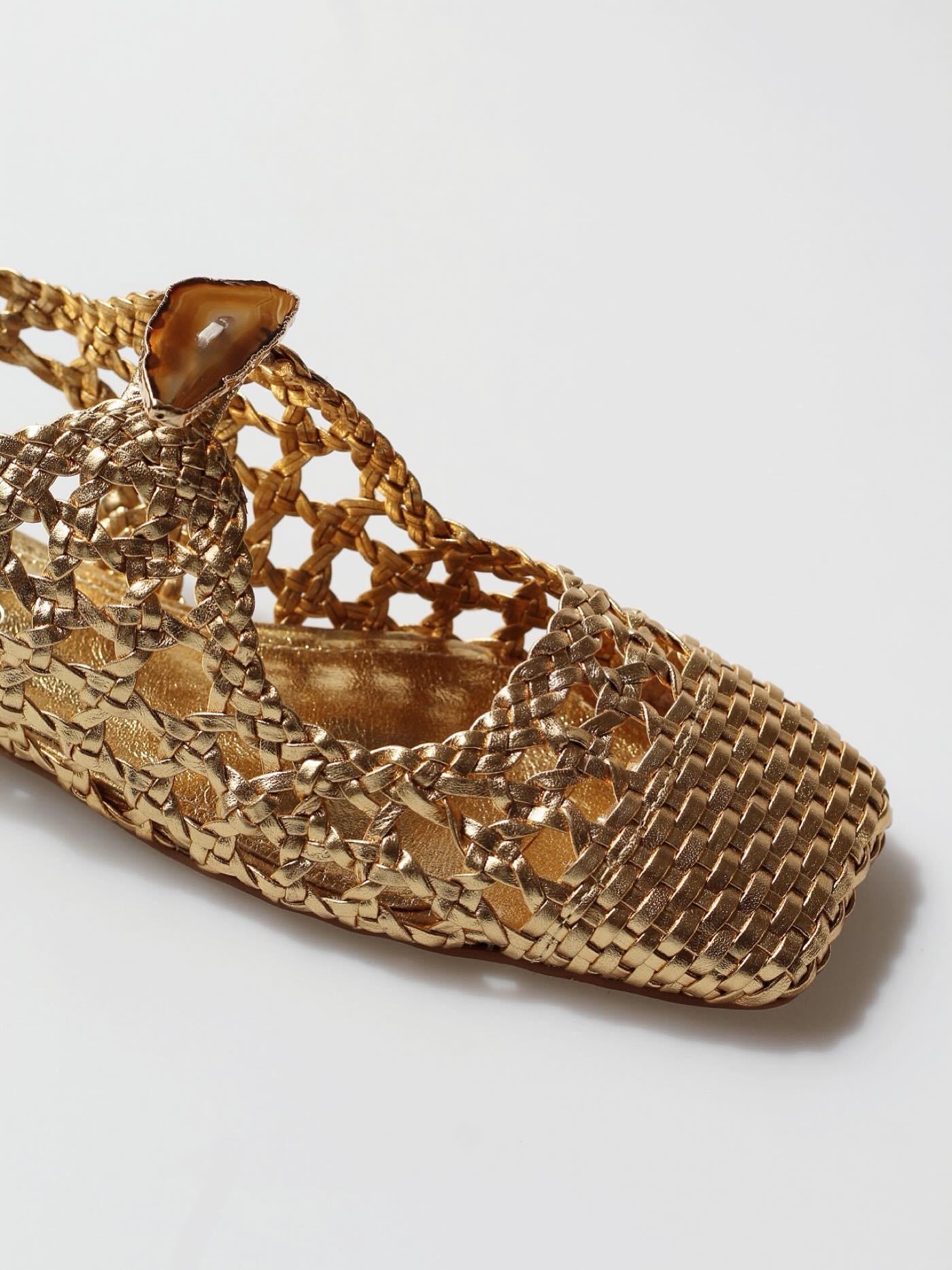 Ballerina Farah in braided dress and natural agate stone.