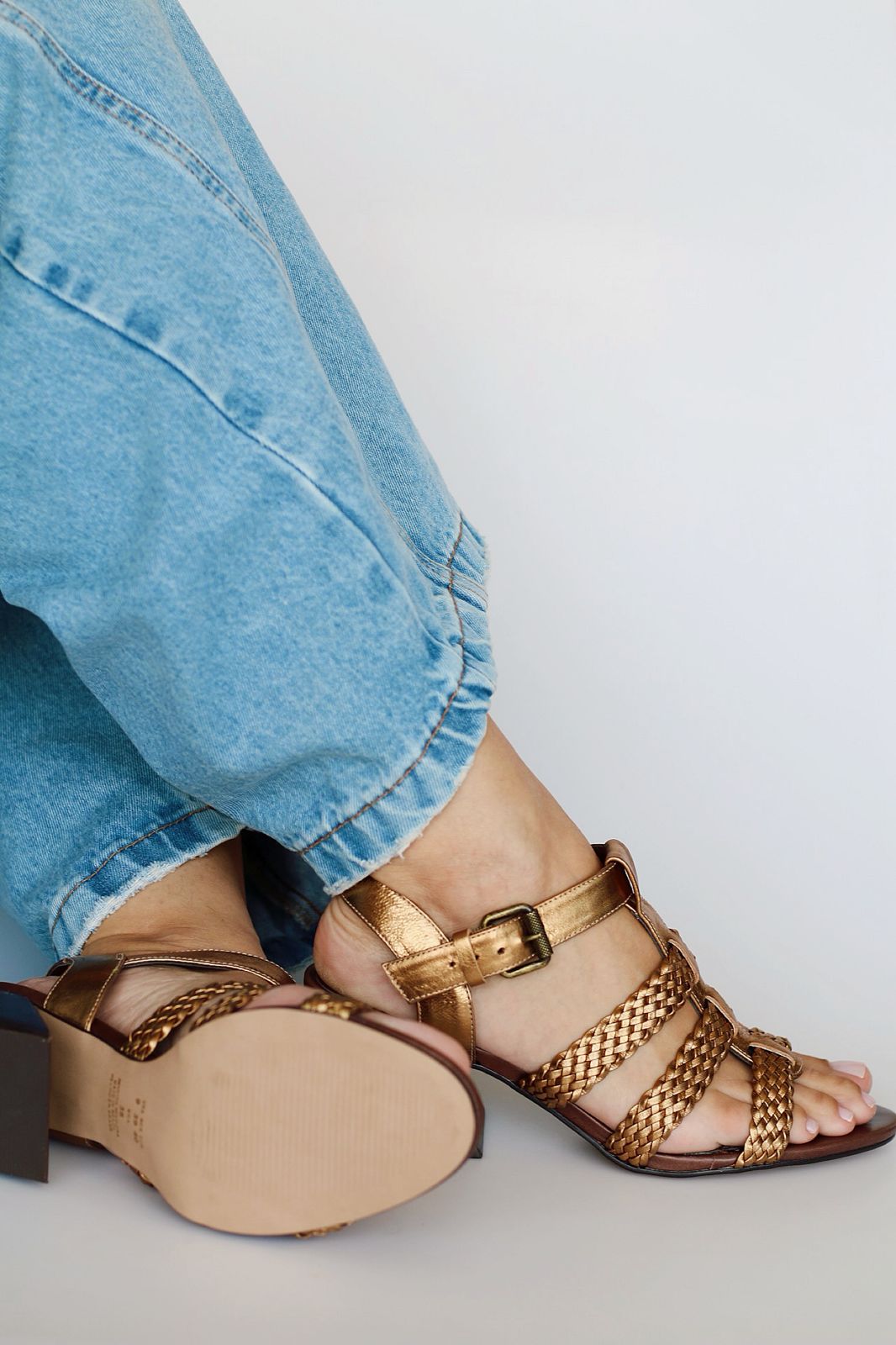 Celeste sandal with braided detail and pyramid heel.