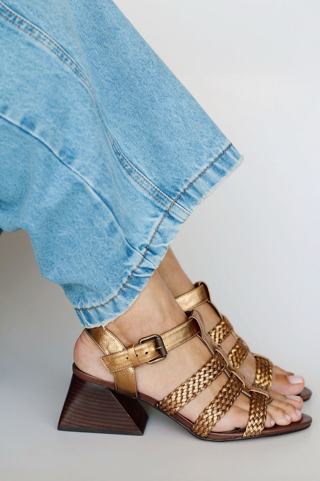Celeste sandal with braided detail and pyramid heel.