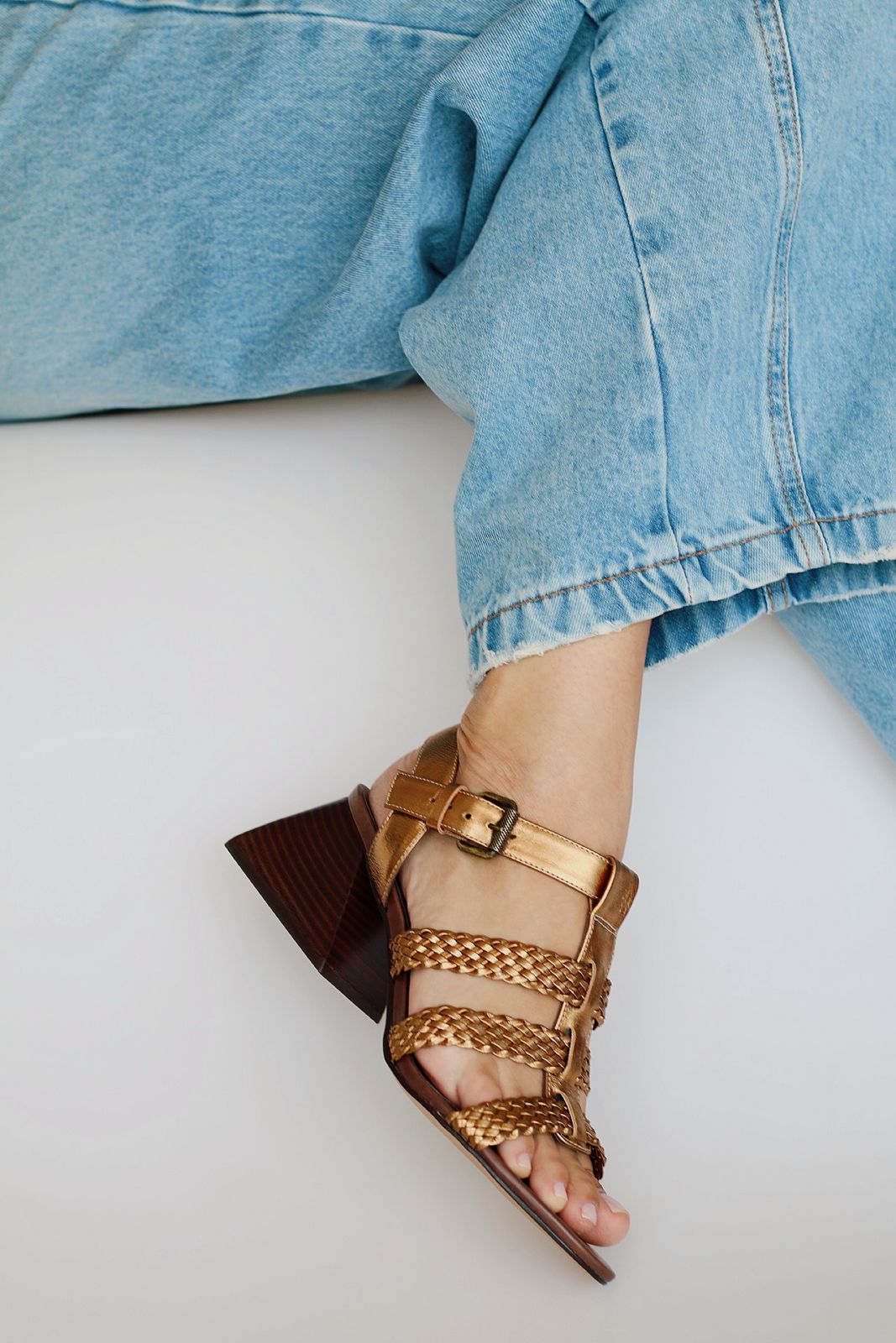 Celeste sandal with braided detail and pyramid heel.