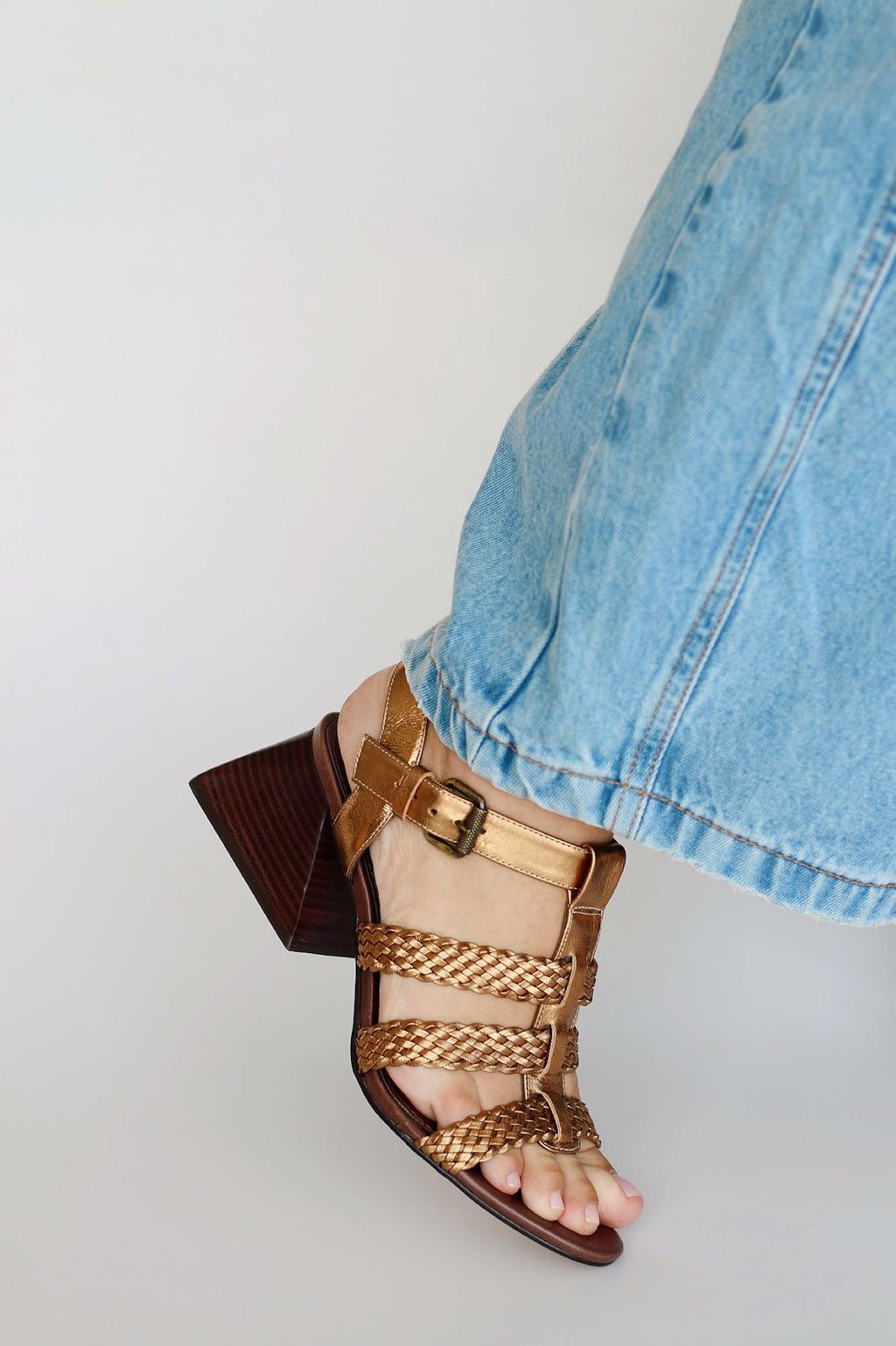 Celeste sandal with braided detail and pyramid heel.