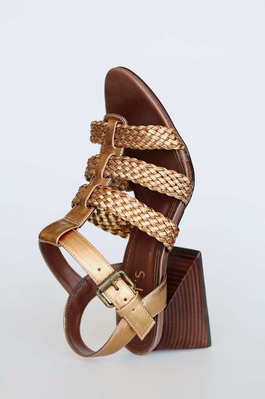 Celeste sandal with braided detail and pyramid heel.