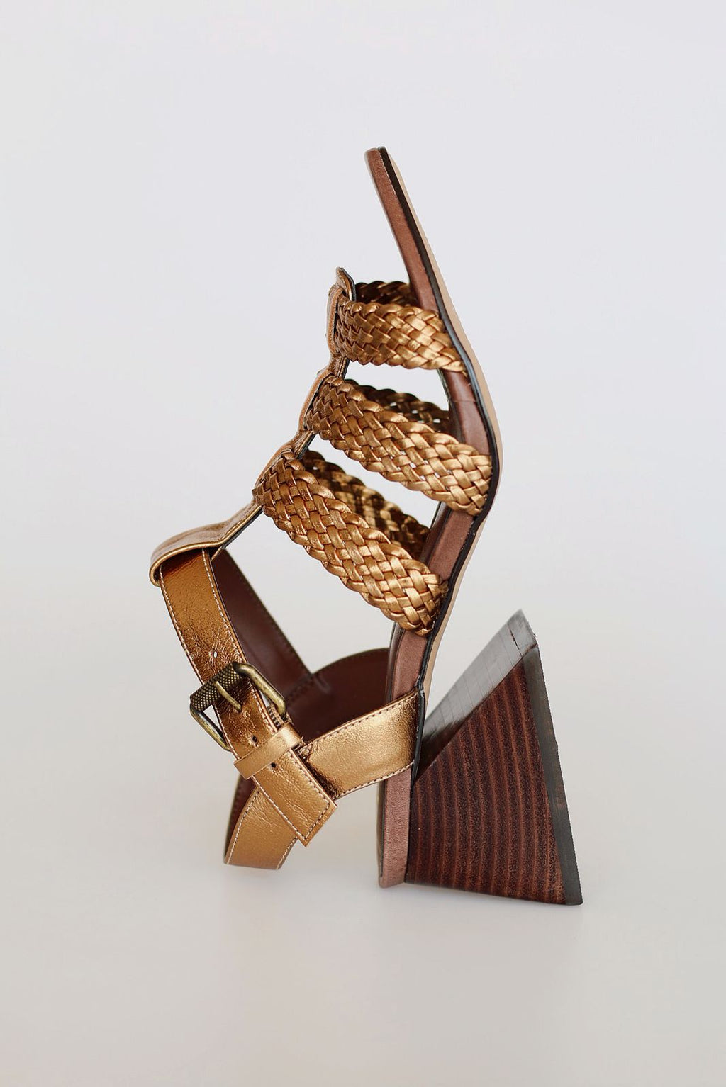 Celeste sandal with braided detail and pyramid heel.