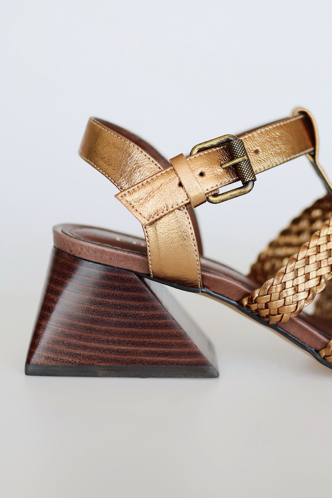 Celeste sandal with braided detail and pyramid heel.