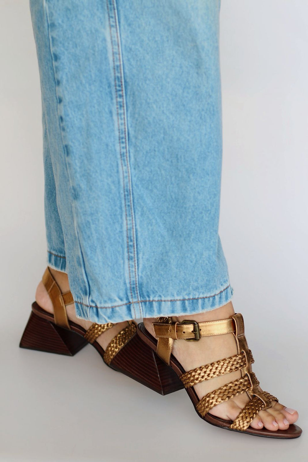 Celeste sandal with braided detail and pyramid heel.