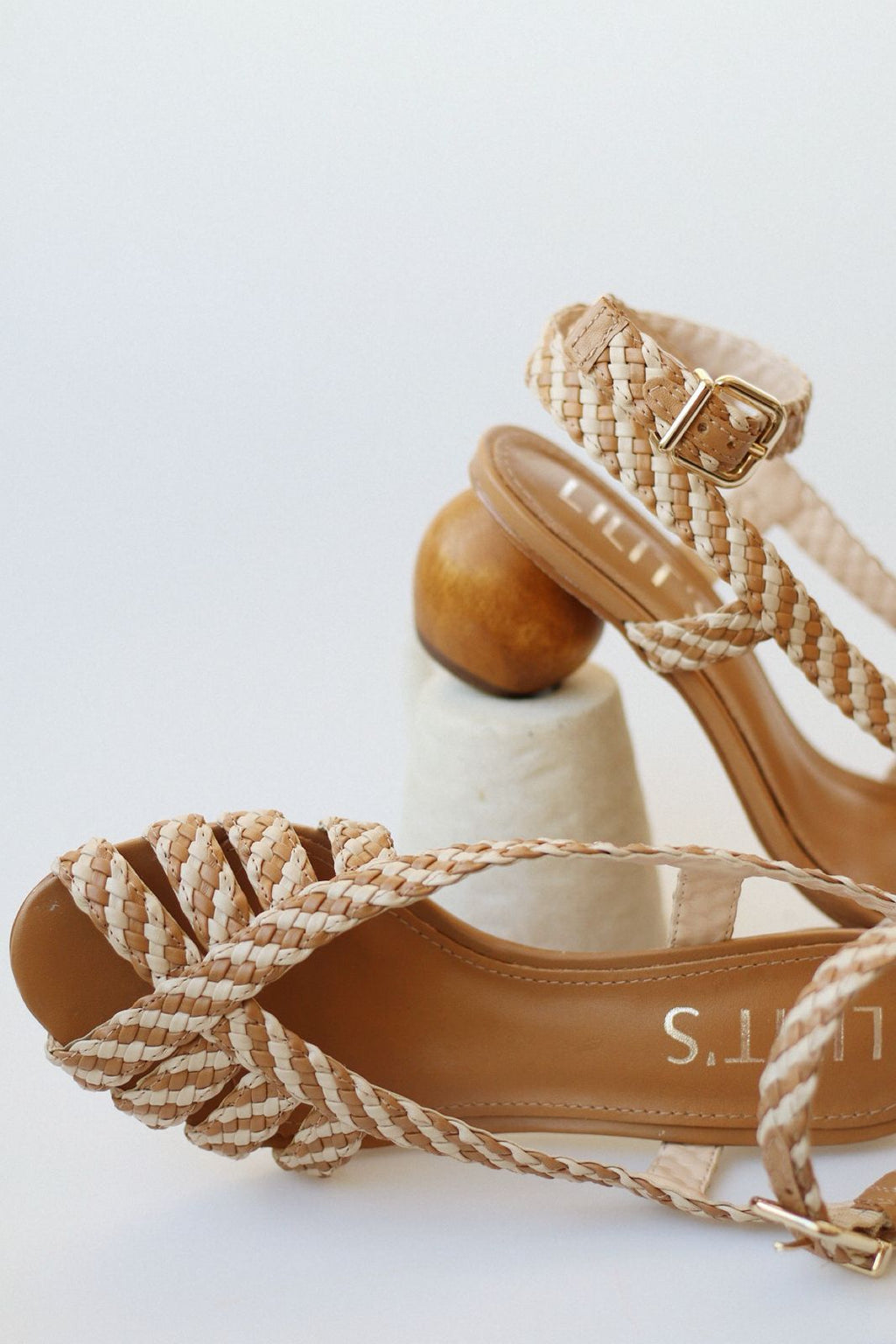 Abby sandal with two-tone braided detail and chestnut wood heel.