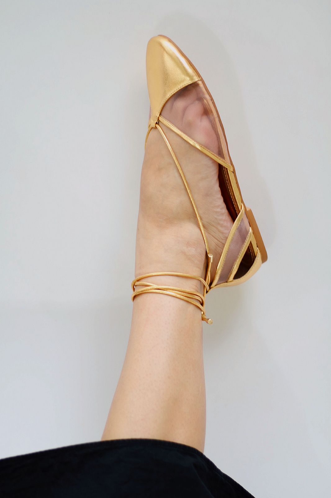 Gold ballerina Valerie with mesh details.