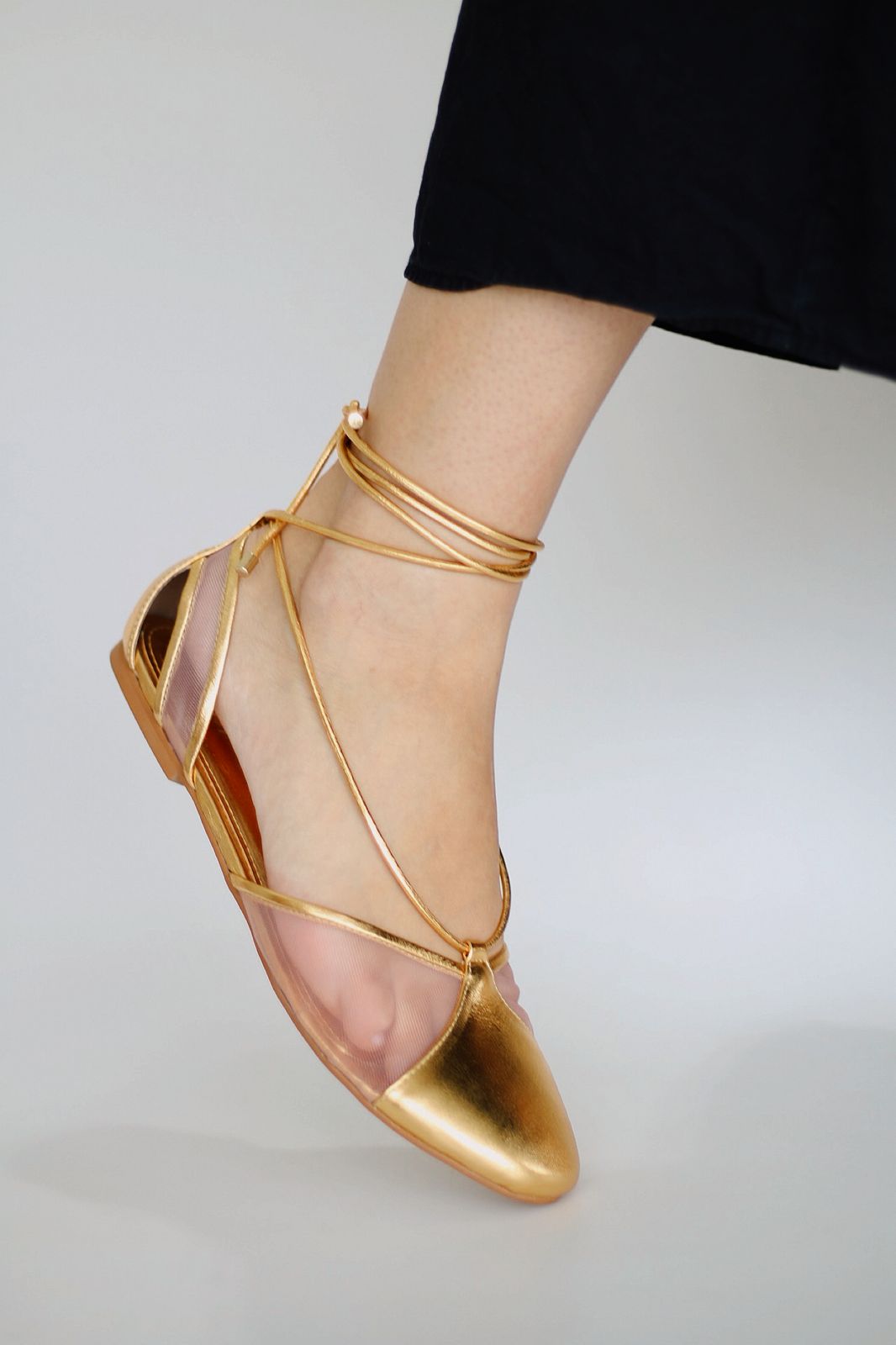 Gold ballerina Valerie with mesh details.